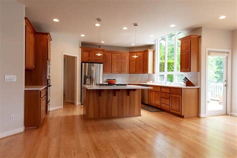 honey oak cabinets with stainless steel appliances and painted walls|cabinet pulls for honey oak.